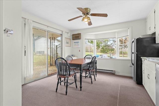 dining area featuring a wall mounted air conditioner, light carpet, a ceiling fan, and a baseboard heating unit