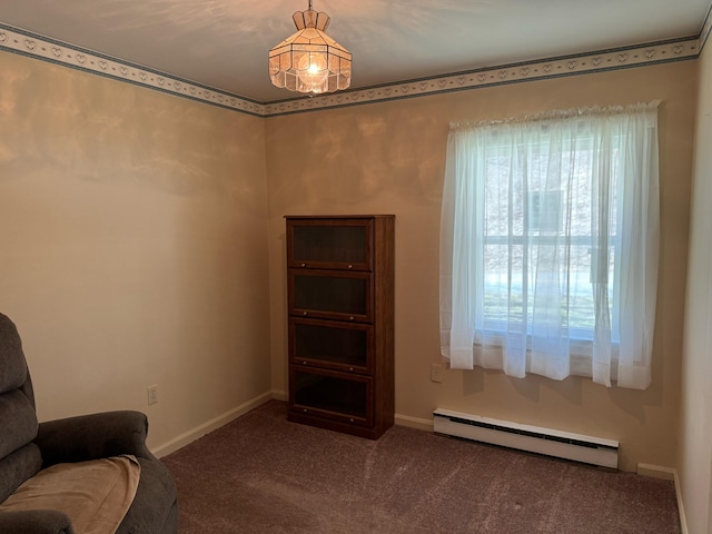1615 Dolly Ann Dr, Covington, VA 24426 - living area featuring a baseboard heating unit, carpet floors, and baseboards