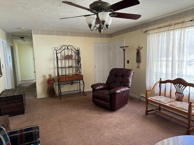 1615 Dolly Ann Dr, Covington, VA 24426 - living area featuring ceiling fan, carpet flooring, plenty of natural light, and baseboards