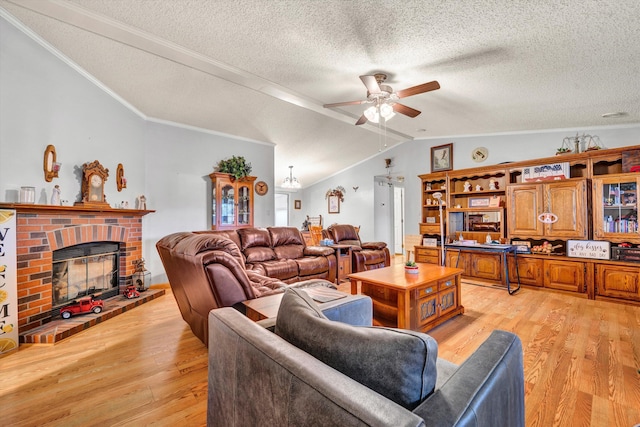 10131 Sontag Rd, Martinsville, VA 24112 - living room with light wood-type flooring, lofted ceiling, a fireplace, and ceiling fan