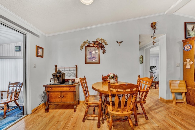 10131 Sontag Rd, Martinsville, VA 24112 - dining space featuring ornamental molding, baseboards, and light wood finished floors