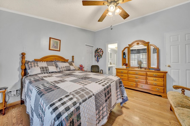 10131 Sontag Rd, Martinsville, VA 24112 - bedroom with a closet, a textured ceiling, ornamental molding, ceiling fan, and light wood-style floors