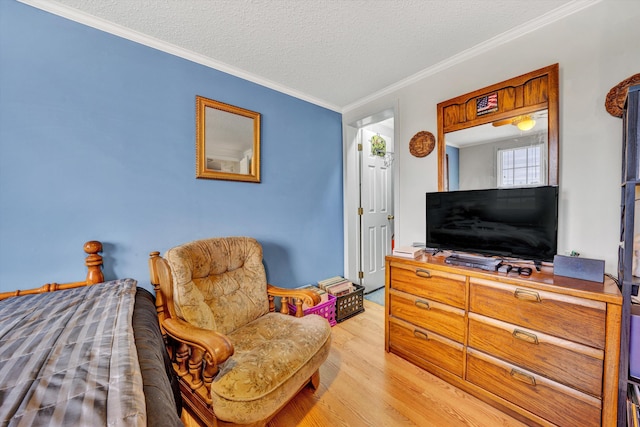 10131 Sontag Rd, Martinsville, VA 24112 - sitting room with a textured ceiling, ornamental molding, and light wood-type flooring