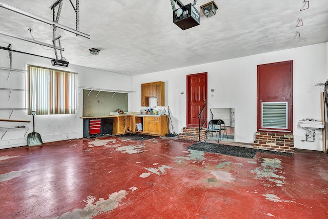 1714 Orchard Dr, Salem, VA 24153 - garage featuring a garage door opener and a workshop area
