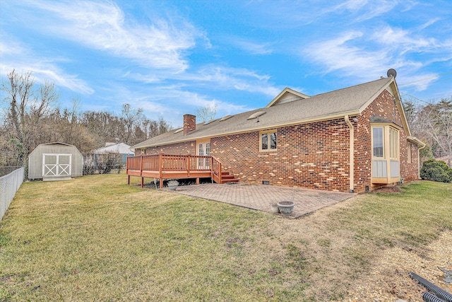 1714 Orchard Dr, Salem, VA 24153 - back of house featuring a deck, a shed, fence, a patio, and an outbuilding