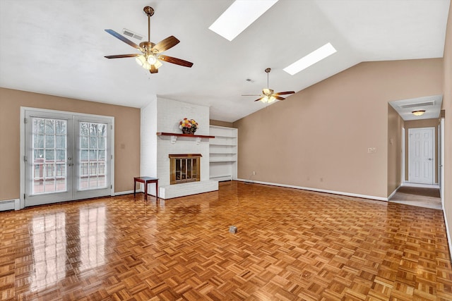 1714 Orchard Dr, Salem, VA 24153 - unfurnished living room with baseboards, a fireplace, visible vents, lofted ceiling with skylight, and ceiling fan