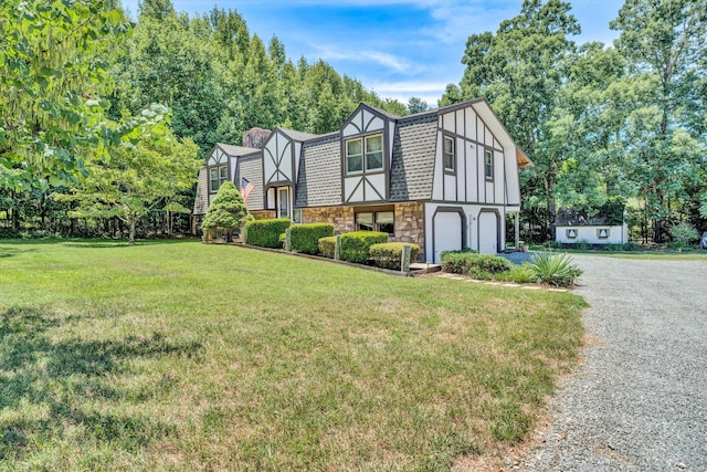 113 Lake Park Dr, Union Hall, VA 24176 - view of side of property with a gambrel roof, an attached garage, stone siding, driveway, and a lawn