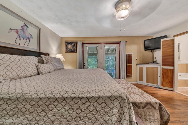 113 Lake Park Dr, Union Hall, VA 24176 - bedroom featuring access to outside, ceiling fan, and wood finished floors