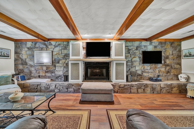 113 Lake Park Dr, Union Hall, VA 24176 - living room featuring a fireplace, visible vents, beamed ceiling, and wood finished floors
