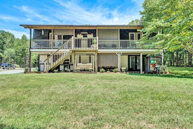 113 Lake Park Dr, Union Hall, VA 24176 - back of property with a lawn, stairs, and a deck