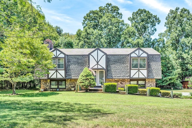 113 Lake Park Dr, Union Hall, VA 24176 - tudor home with stone siding, a shingled roof, and a front lawn