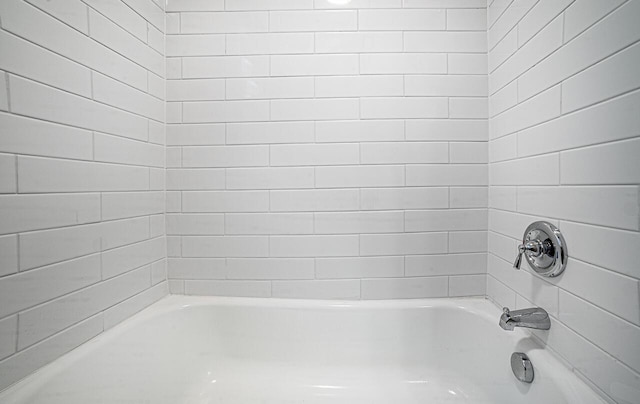 full bathroom with washtub / shower combination