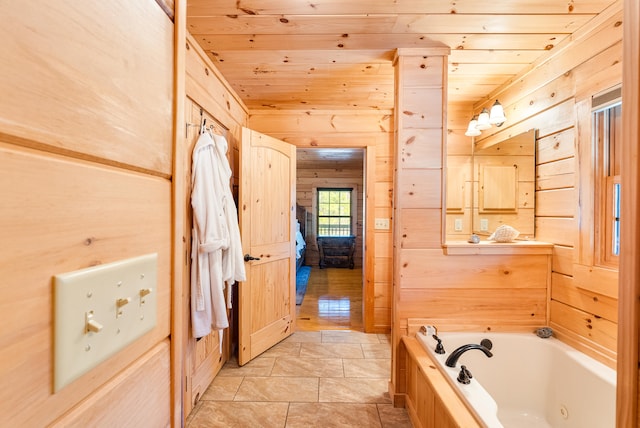 full bathroom with a tub with jets, wooden ceiling, wood walls, and ensuite bathroom
