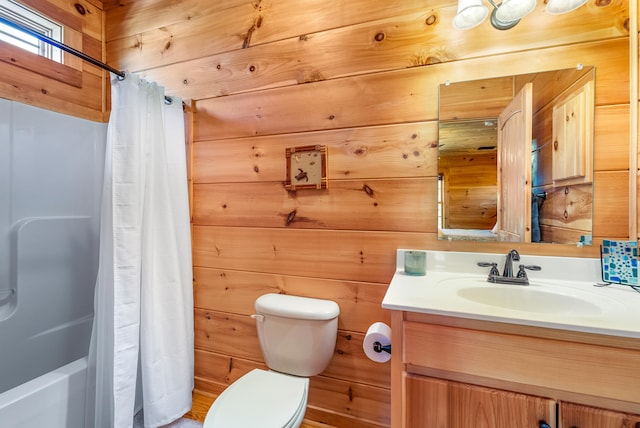 full bathroom with wooden walls, toilet, vanity, and shower / bath combo