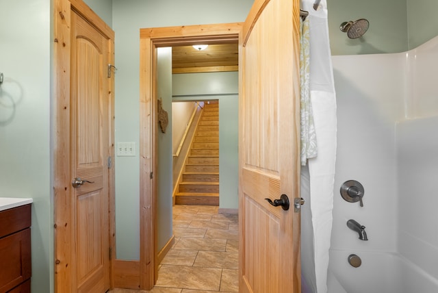 bathroom with vanity and shower / bath combo