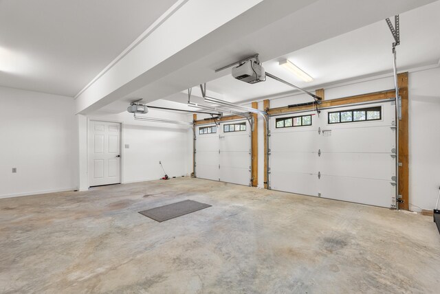 garage featuring a garage door opener