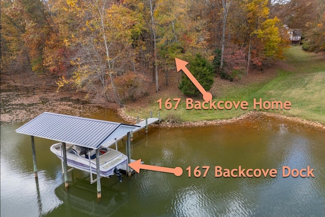 dock area with a water view and boat lift
