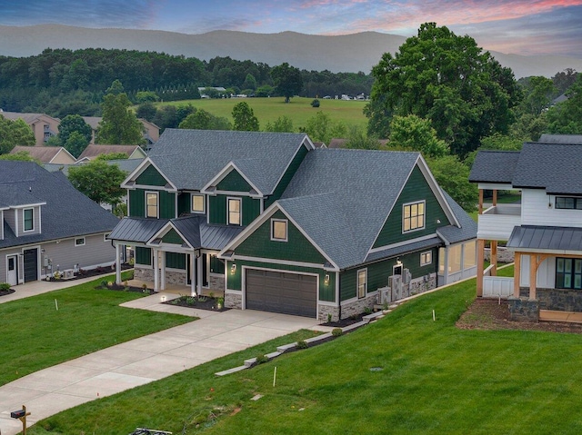1050 Westerham Ct, Huddleston, VA 24104 - craftsman-style house featuring stone siding, a porch, a standing seam roof, and concrete driveway