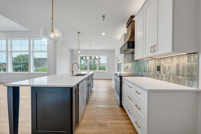 1050 Westerham Ct, Huddleston, VA 24104 - kitchen with electric range, a sink, light wood finished floors, light countertops, and white cabinets