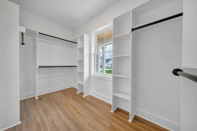 1050 Westerham Ct, Huddleston, VA 24104 - walk in closet featuring wood finished floors