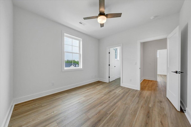 1050 Westerham Ct, Huddleston, VA 24104 - unfurnished bedroom featuring light wood-style floors, baseboards, and a ceiling fan