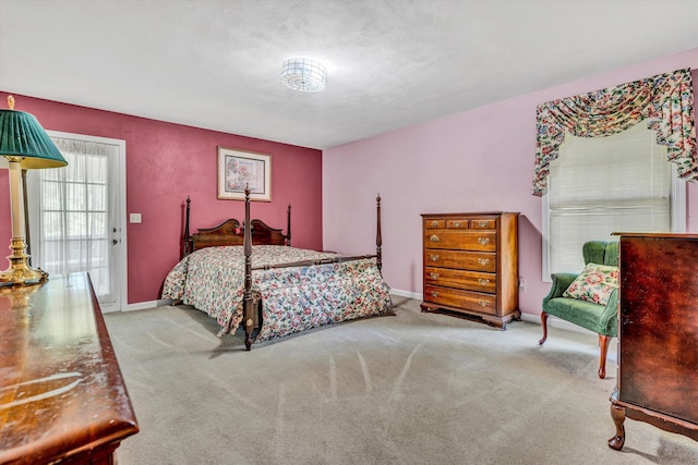 bedroom featuring carpet floors and baseboards
