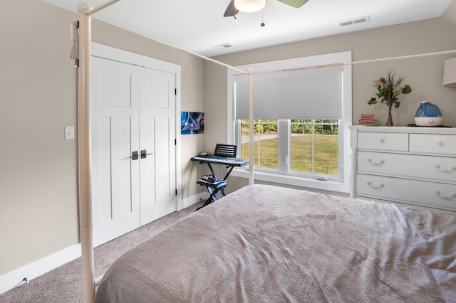 bedroom with carpet flooring, baseboards, a ceiling fan, and visible vents