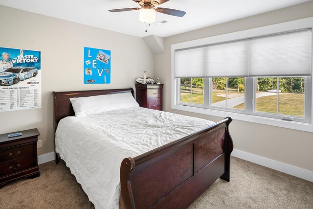 bedroom with light colored carpet, baseboards, and visible vents