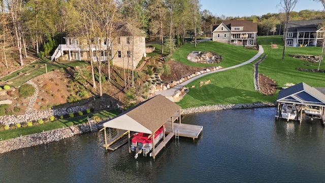 drone / aerial view with a water view