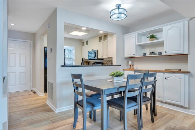 1791 Windlass Rd, Moneta, VA 24121 - dining area featuring baseboards, recessed lighting, and light wood-style floors