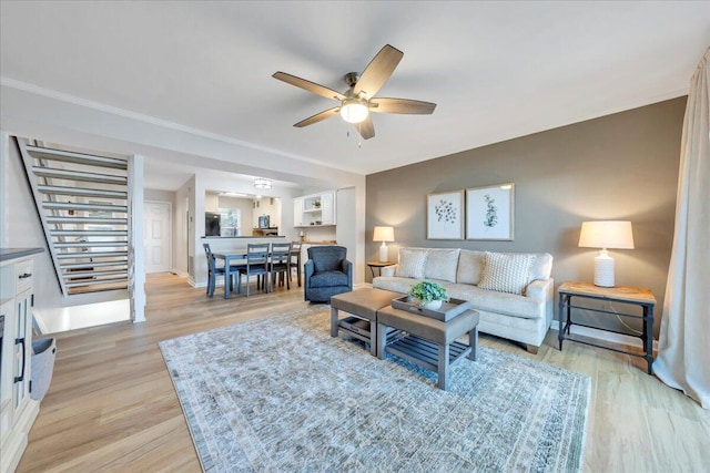 1791 Windlass Rd, Moneta, VA 24121 - living area featuring light wood-type flooring, a ceiling fan, and crown molding