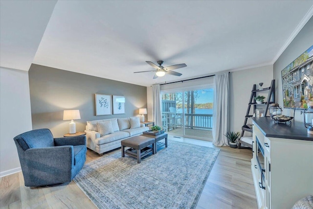 1791 Windlass Rd, Moneta, VA 24121 - living room featuring ceiling fan, crown molding, and light wood finished floors
