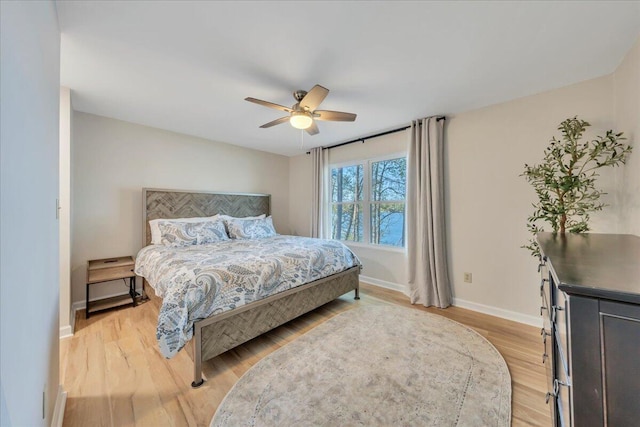1791 Windlass Rd, Moneta, VA 24121 - bedroom with light wood-style floors, ceiling fan, and baseboards