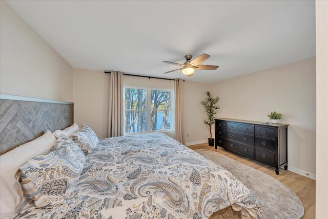 1791 Windlass Rd, Moneta, VA 24121 - bedroom featuring a ceiling fan, wood finished floors, and baseboards