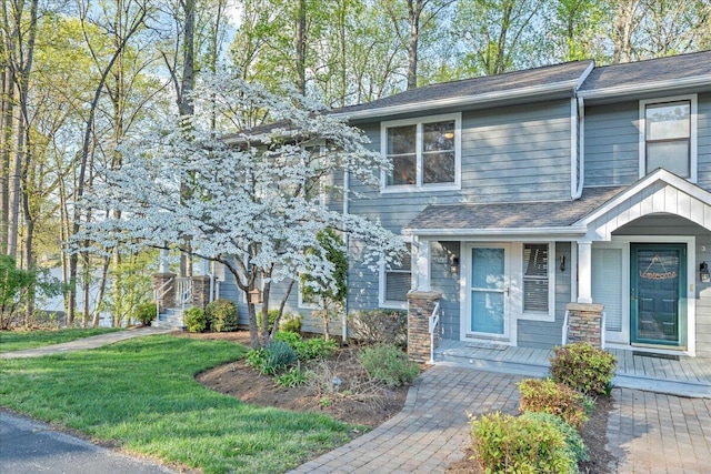 1791 Windlass Rd, Moneta, VA 24121 - view of front of property featuring roof with shingles, covered porch, and a front yard