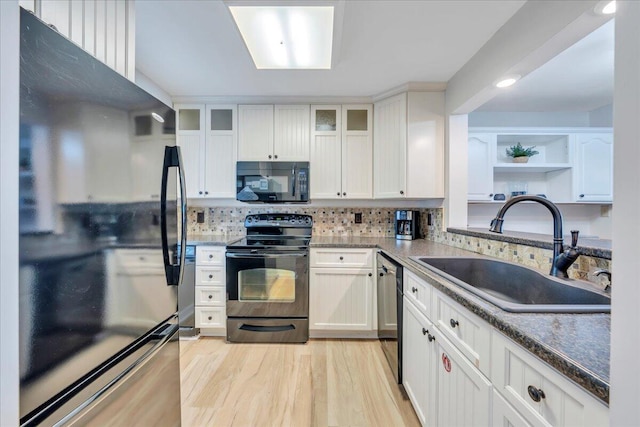 1791 Windlass Rd, Moneta, VA 24121 - kitchen featuring black appliances, a sink, white cabinets, and open shelves