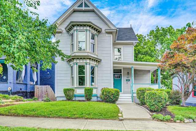 535 Day Ave SW, Roanoke, VA 24016 - victorian-style house featuring covered porch and a front yard