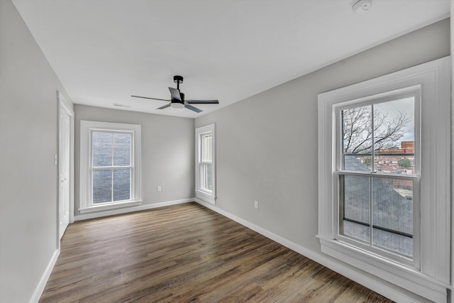 535 Day Ave SW, Roanoke, VA 24016 - unfurnished room with wood finished floors, ceiling fan, baseboards, and visible vents