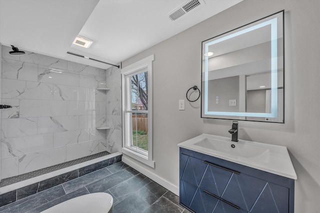535 Day Ave SW, Roanoke, VA 24016 - bathroom with visible vents, baseboards, toilet, a tile shower, and vanity