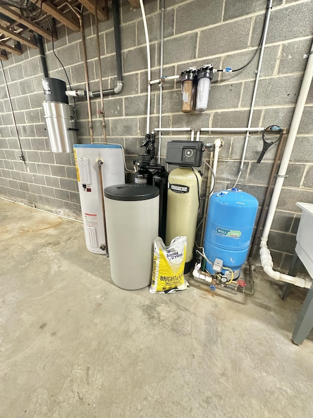 utility room with electric water heater