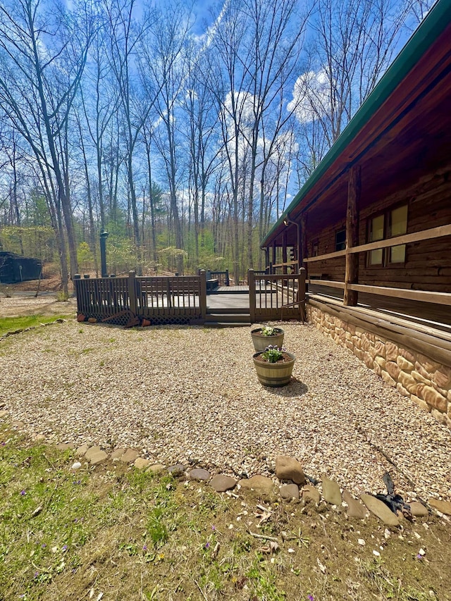 view of yard featuring a deck