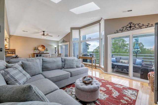 114 Waterside Cir Unit B-6, Moneta, VA 24121 - living area featuring light wood-style flooring, a skylight, lofted ceiling, ceiling fan, and recessed lighting