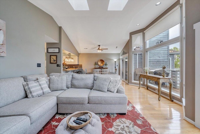114 Waterside Cir Unit B-6, Moneta, VA 24121 - living area with light wood-style floors, a skylight, high vaulted ceiling, ceiling fan, and recessed lighting