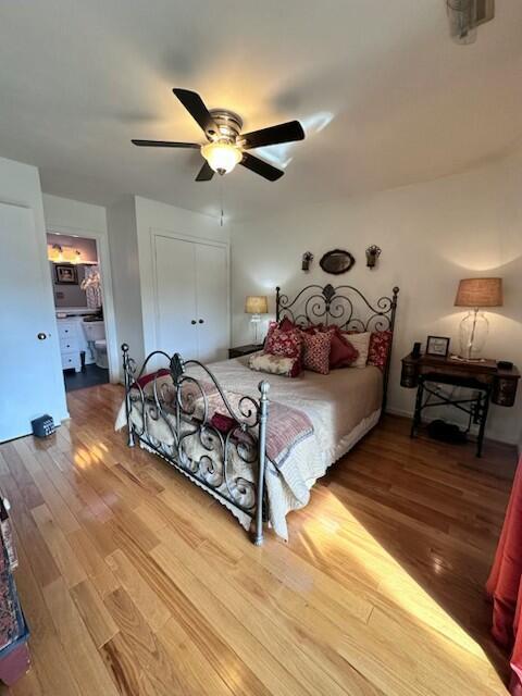 114 Waterside Cir Unit B-6, Moneta, VA 24121 - bedroom with wood finished floors, a closet, and a ceiling fan