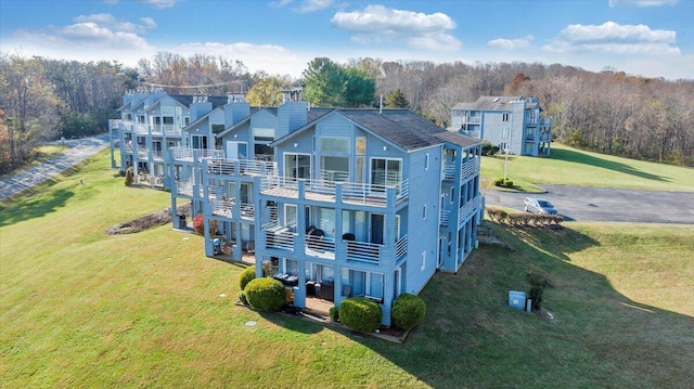 114 Waterside Cir Unit B-6, Moneta, VA 24121 - back of house featuring a balcony and a lawn