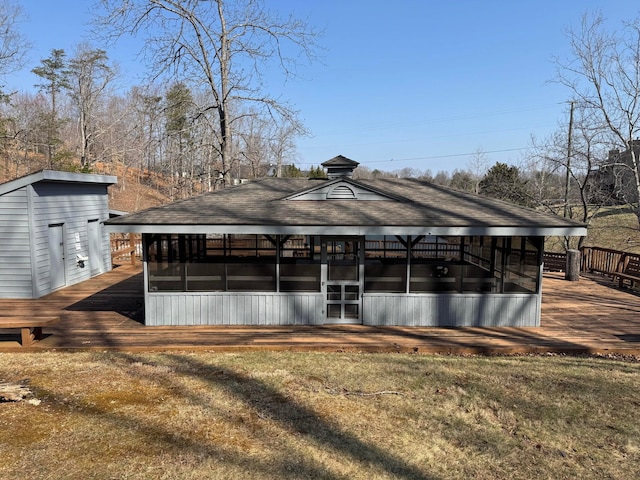 114 Waterside Cir Unit B-6, Moneta, VA 24121 - back of property featuring a deck, a shingled roof, and a sunroom