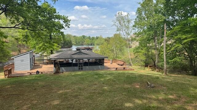 114 Waterside Cir Unit B-6, Moneta, VA 24121 - view of green lawn with a gazebo, a deck, and a forest view