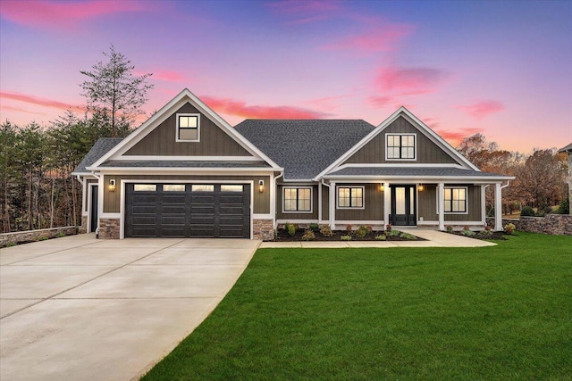 120 Pointe O Woods Dr, Huddleston, VA 24104 - view of front of house with driveway, a lawn, covered porch, a garage, and stone siding