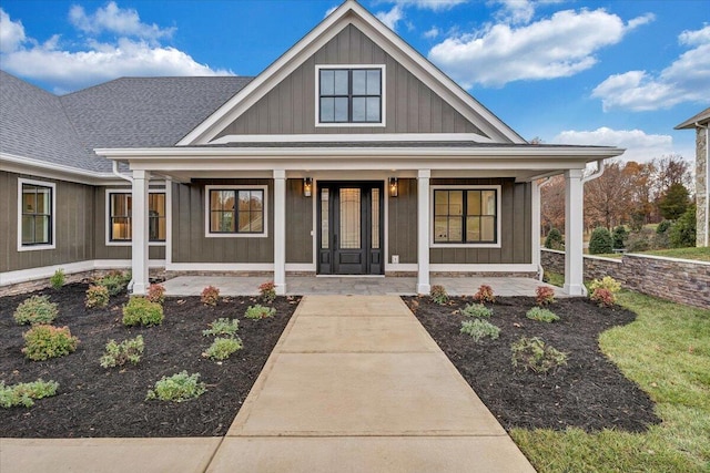 120 Pointe O Woods Dr, Huddleston, VA 24104 - view of front of property featuring board and batten siding, covered porch, and roof with shingles