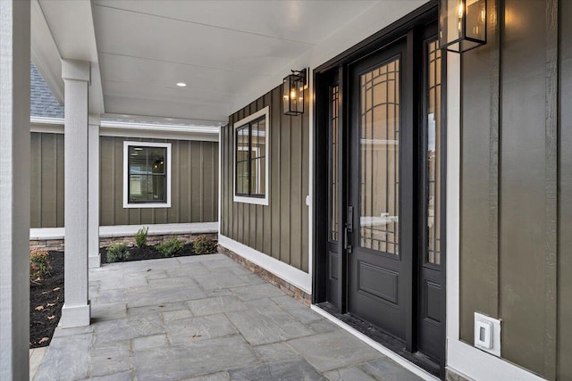 120 Pointe O Woods Dr, Huddleston, VA 24104 - property entrance with a porch and board and batten siding